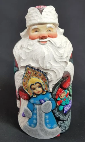 Père Noël avec la Petite Fille des Neiges